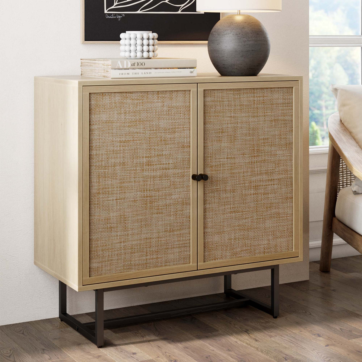 Kova light oak storage cabinet with rattan-look doors and matte black details