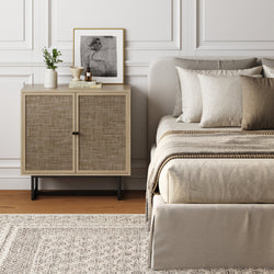 Kova light oak storage cabinet styled in a living room